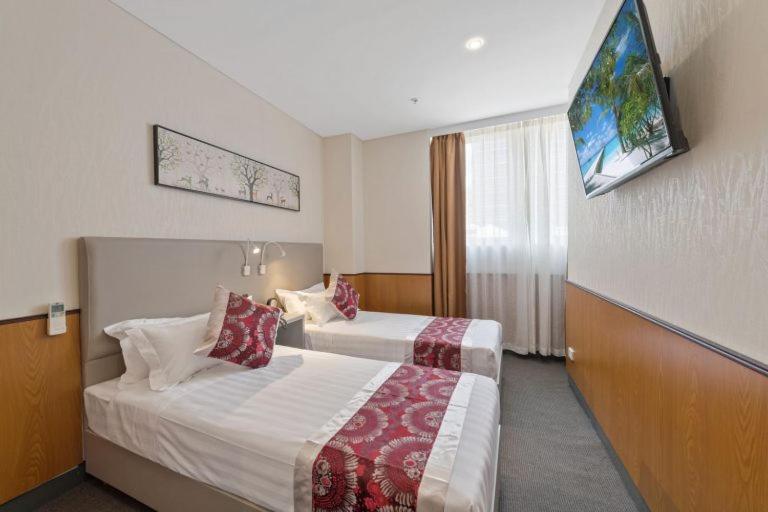 Quality Inn Hotel Кигали Экстерьер фото